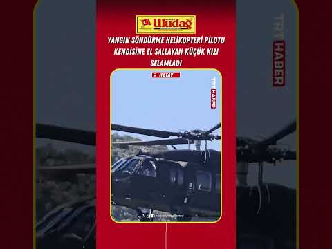 Hatay'da yangın söndürme helikopterinin pilotu kendisine el sallayan kızı selamladı